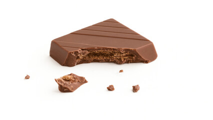 Milk chocolate pieces on a white background
