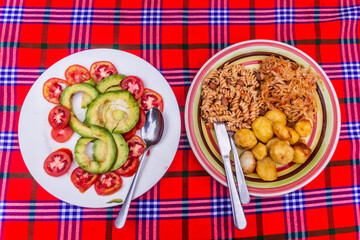 Meal in Uganda - pasta, potatoes and salad