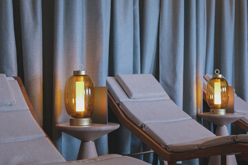 Thermal suite relaxation room loungers or chairs in spa or wellness area on modern luxury...