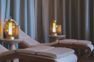 Thermal suite relaxation room loungers or chairs in spa or wellness area on modern luxury...