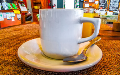 Cup of americano black coffee in restaurant cafe in Mexico.