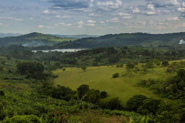 Fototapeta premium Lush rural landscape with Nyabikere lake near Fort Portal, Uganda