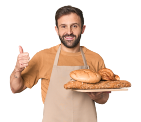 Hispanic male baker with bread tray smiling and raising thumb up