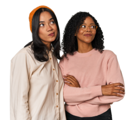 Young Latin friends together in studio dreaming of achieving goals and purposes