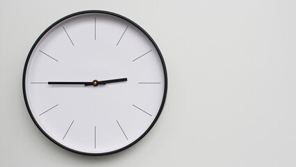 Wall Clock Showing 14.45/02.45 O'Clock on White Wooden Surface - Perfect for Time Management and Scheduling Concepts