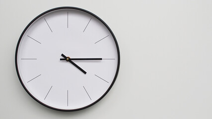Wall Clock Showing 16.15/ 04.15 O'Clock on White Wooden Surface - Perfect for Time Management and Scheduling Concepts