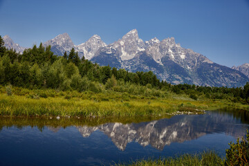 Teton reflection on a blue bird day