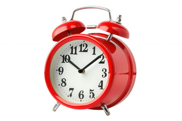 A classic red alarm clock with black hands and numbers, isolated on a black background.