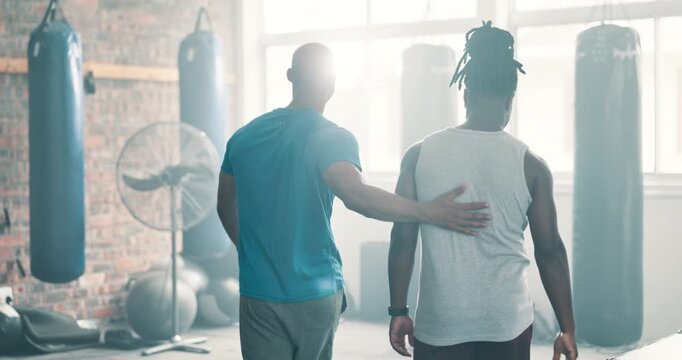 Men, fitness teamwork and high five in gym for workout or training challenge, boxing match or to start practice. Young people, personal trainer or boxer shaking hands for goals, support and good luck