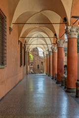 The famous porticoes of Bologna, Italy, near the Basilica of Santo Stefano © Marco Taliani