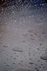 Water drops on the platic surface. Water drops. Closeup of photo
