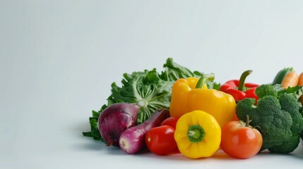 Fresh colorful vegetables on white background. Vibrant image featuring different vegetables. Perfect for healthy eating concepts and diet visuals. High-quality food photography for multiple uses. AI
