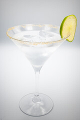 Alcoholic cocktail in a martini glass.
