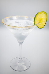 Alcoholic cocktail in a martini glass.
