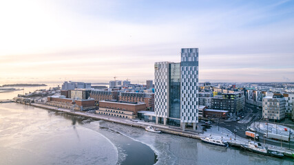 drone aerial photo of city of Helsinki Finland on a snowy cold day