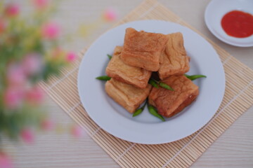 Tahu Bakso, Indonesian traditional snack made from tofu and beef. Served in white plate.