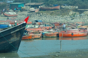 Passenger boat with people travelling by sea in Chittagong Bangladesh