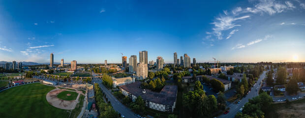 Fototapeta premium Residential Homes and Buildings in suburban city area. Aerial Panorama.