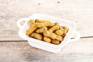 Raw ripe unpeeled peanut heap