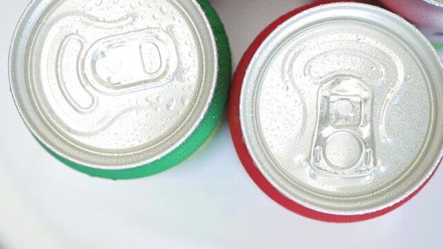 Various Cold, Sweet, and Carbonated Refreshing Drinks. Shooting with Refreshing Pop Can Drinks.
