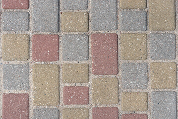 Top view multi-colored rectangular paving stones.