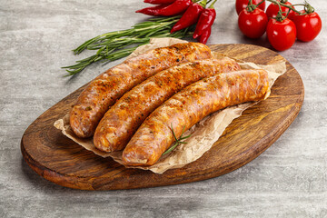 Raw sausages with spices and herbs