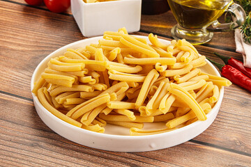Raw dry Italian pasta - casarecce