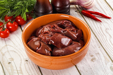 Raw chicken liver uncooked in the bowl