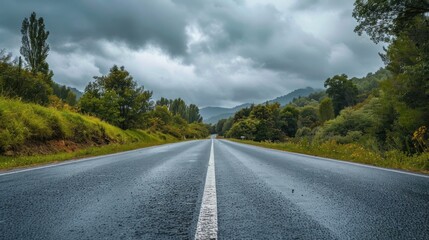 Serene Road Through Forested Hills