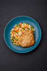 Delicious boiled rice with vegetables or risotto with carrots, peas and corn