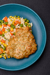 Delicious boiled rice with vegetables or risotto with carrots, peas and corn