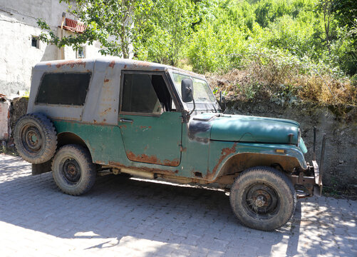Old and rusty abandoned military jeep