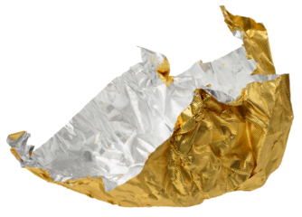 Crumpled sheet of golden foil, candy wrapper on isolated background