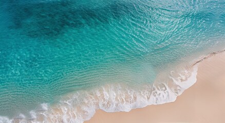 Fototapeta premium Aerial View of Waves Crashing on Sandy Beach
