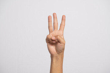Deaf alphabet letter W by hand. Letter 'W' in sign language, isolated on a white background. Hand...