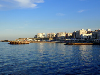Obraz premium Alger the capital city of Algeria, North Africa, city centre of Algiers, the capital of Algeria, Landscape of Algiers city With port and mediterranean sea and white buildings, Arab Maghreb Africa.