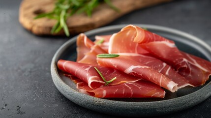 Sliced Prosciutto on Grey Plate