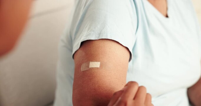 Clinic, patient and arm of woman with bandage in injection for healthcare, protection and parasite safety. Medical, help and hands of person with band aid for malaria vaccine, immunization or support