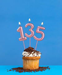 Candle number 135 - Birthday card with cupcake on blue background