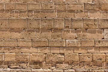 Ancient Greek stone wall texture background.