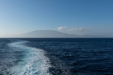 Naklejka premium Island in the fog in Zakynthos, Greece. Ionian Sea.