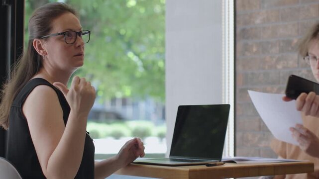 HR manager conducts interview with job candidate. Process of interview exemplifies meticulous nature of recruitment and importance of finding right match HR manager interview with new candidate