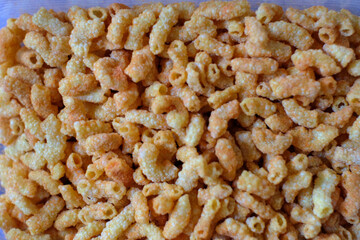 Deep fried macaroni flavored with salt and various spicy herbs native to South East Asia. This enticing food is great for snacking, homemade food.