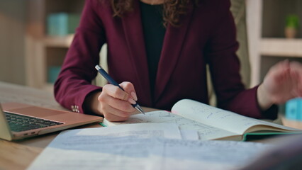 Worker hand writing notebook closeup. Smiling businesswoman typing computer