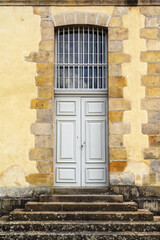 Elegant Wooden Door with Arched Window at Chateau de Fontainebleau