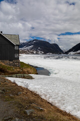 Djupvatnet Lake High Above Geiranger Fjord Norway Still Frozen Over in Midsummer, View from the Hotel