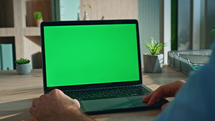 Director watching greenscreen laptop office close up. Unrecognizable freelancer 
