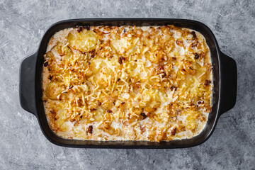 cheesy creamy potato bake before going in the oven