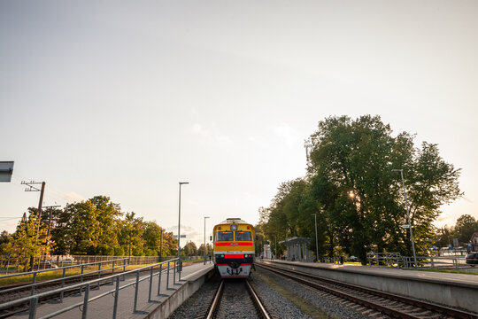 SIGULDA, LATVIA - AUGUST 21, 2023: Selective blur on a regional train, a diesel DMU of LDZ Latvijas Dzelzcels Pasazieru Vilciens latvian railways ready for departure in Sigulda to Riga.