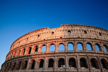 The Colosseum in Rome, an iconic ancient amphitheater, showcasing its historic architecture and...